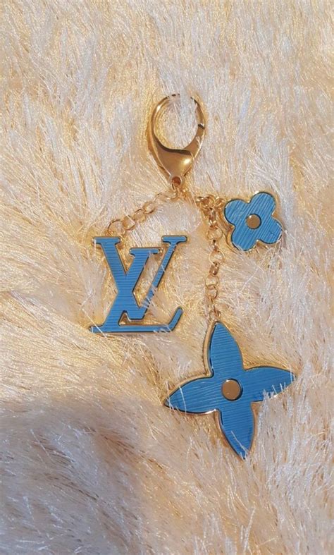 lv flower doll keychain|luxury keychains for women.